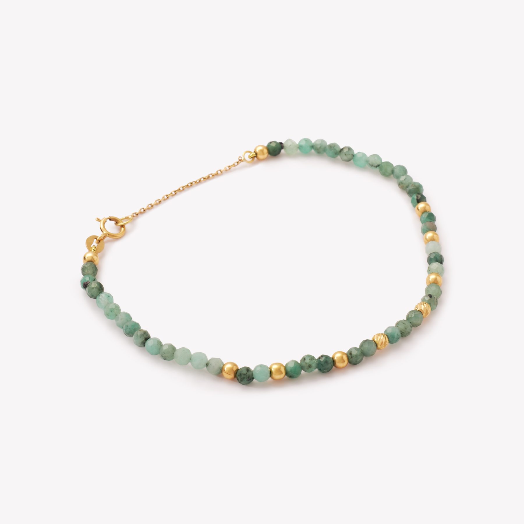 Pulsera en oro 18k amarillo, con Piedras esmeraldas.
