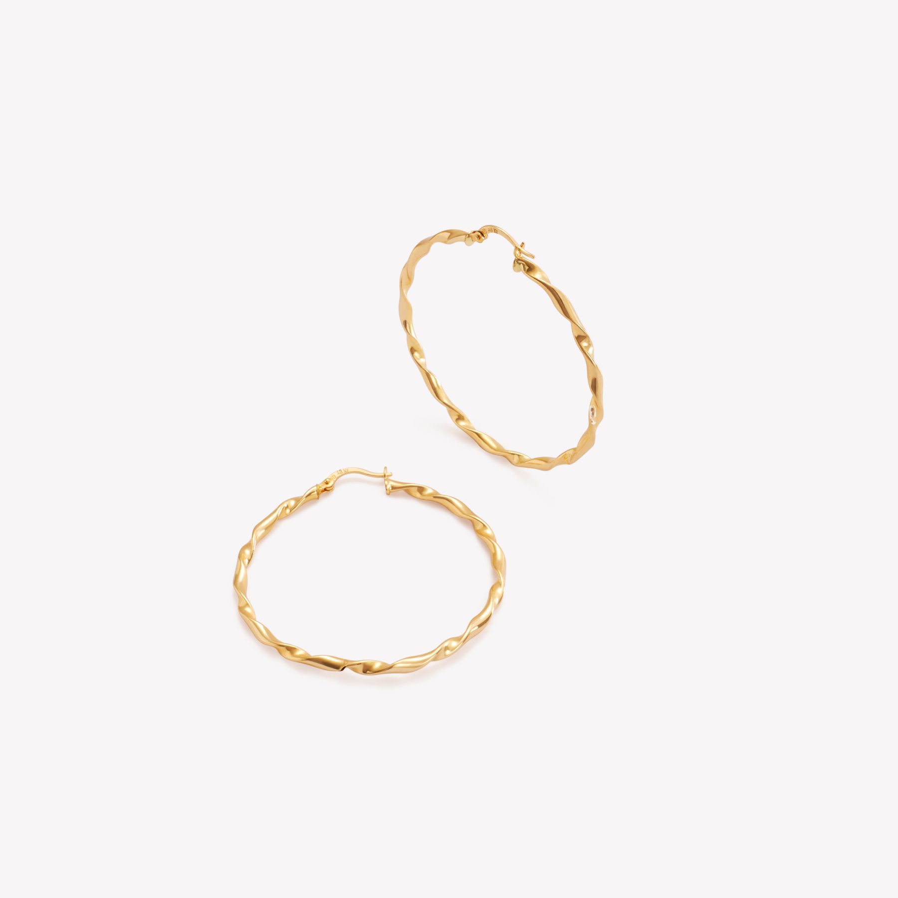 Argollas ENTORCHADAS DELGADAS en oro amarillo 18k
