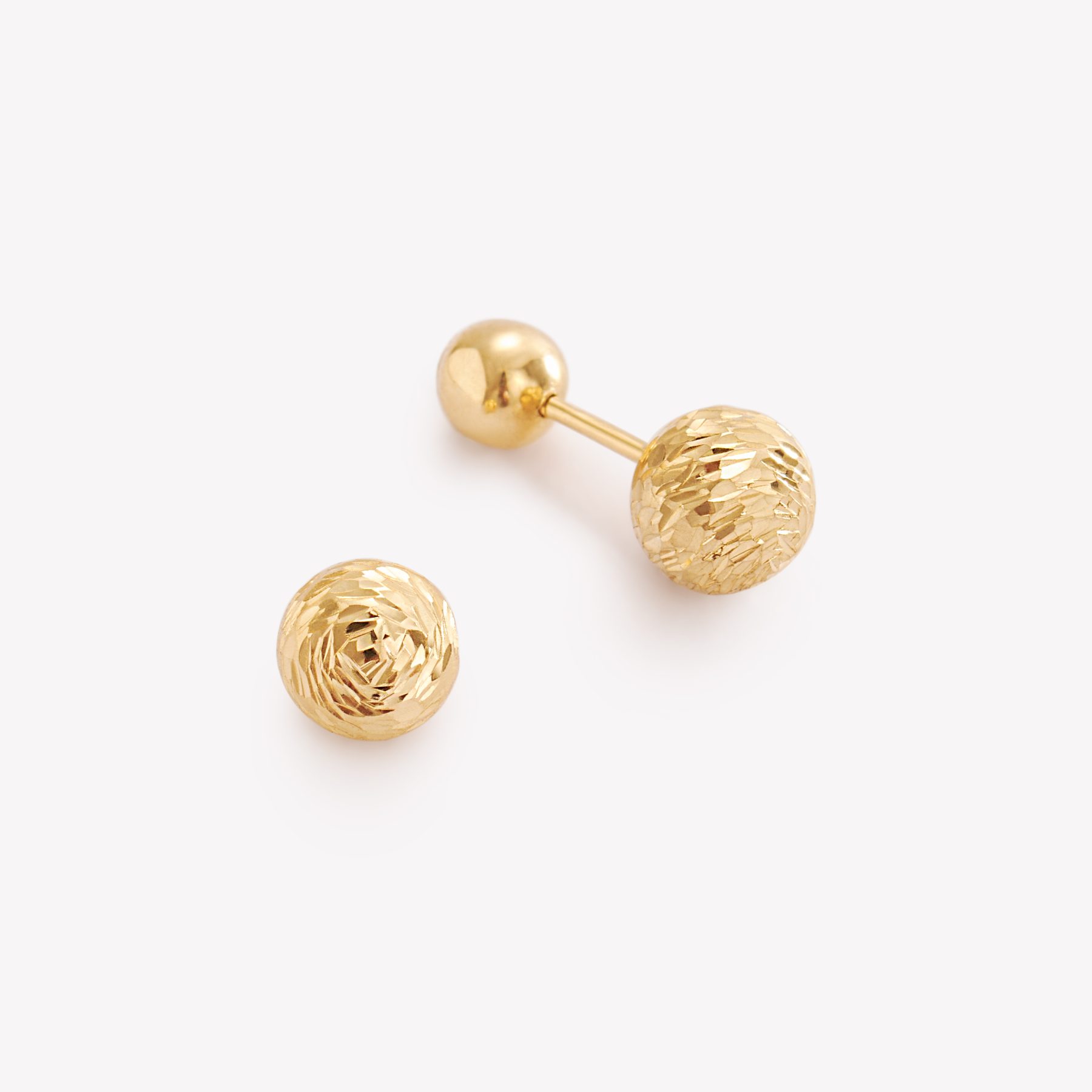 Aretes BOMBAS TEXTURA DIAMANTADA en oro amarillo 18k