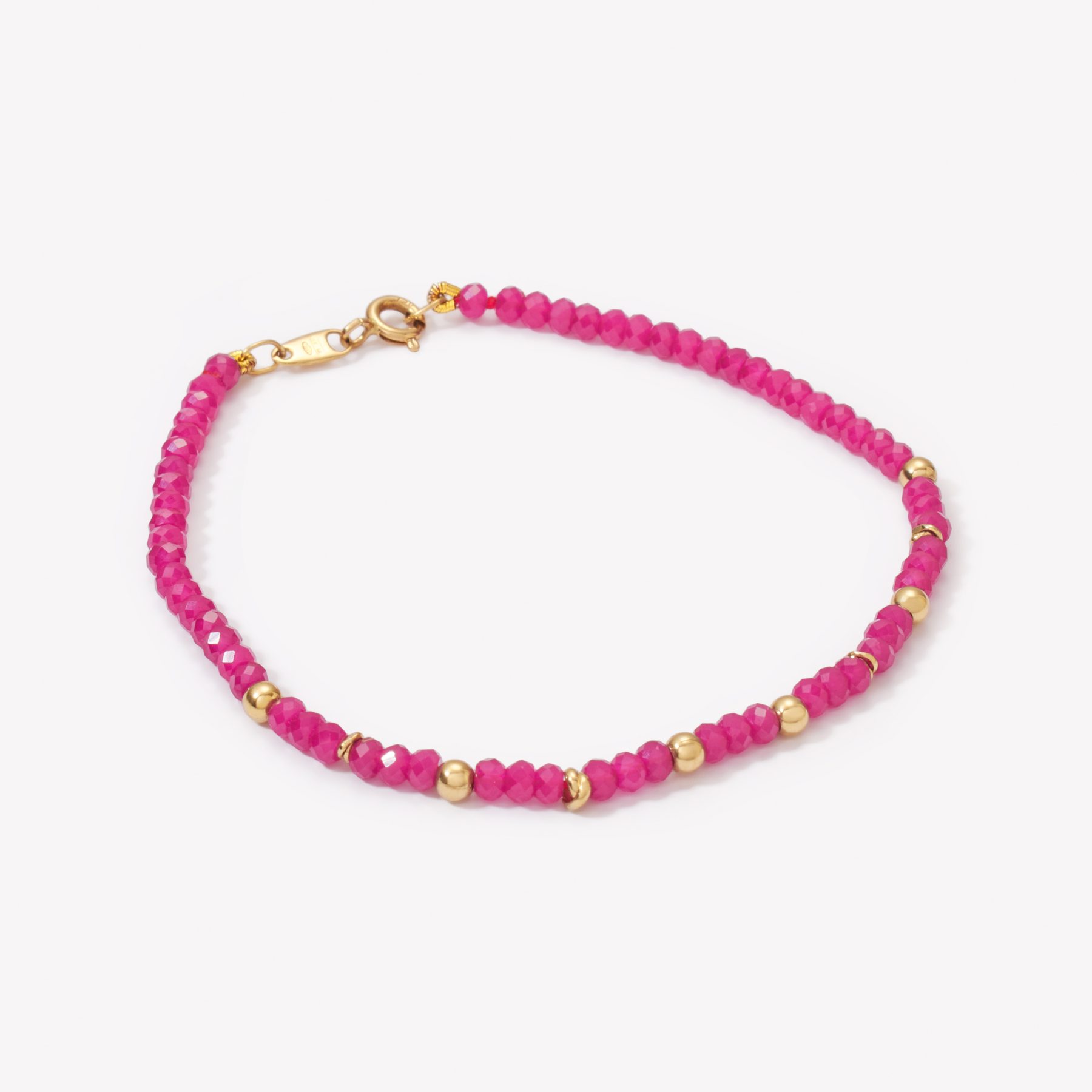 Pulsera con RUBÍES y aditamentos de oro 18k