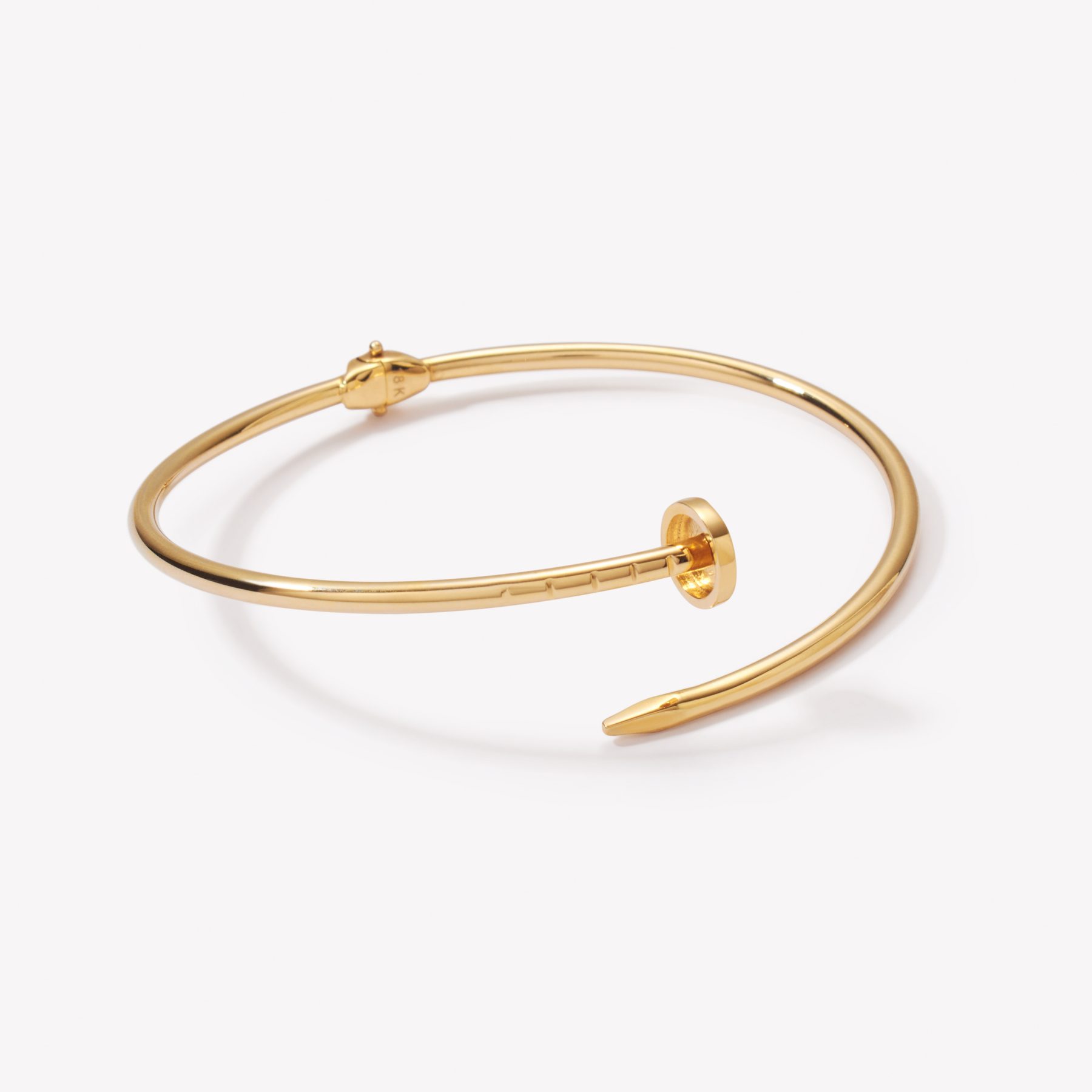 SEMANARIO CLAVO en oro amarillo 18k
