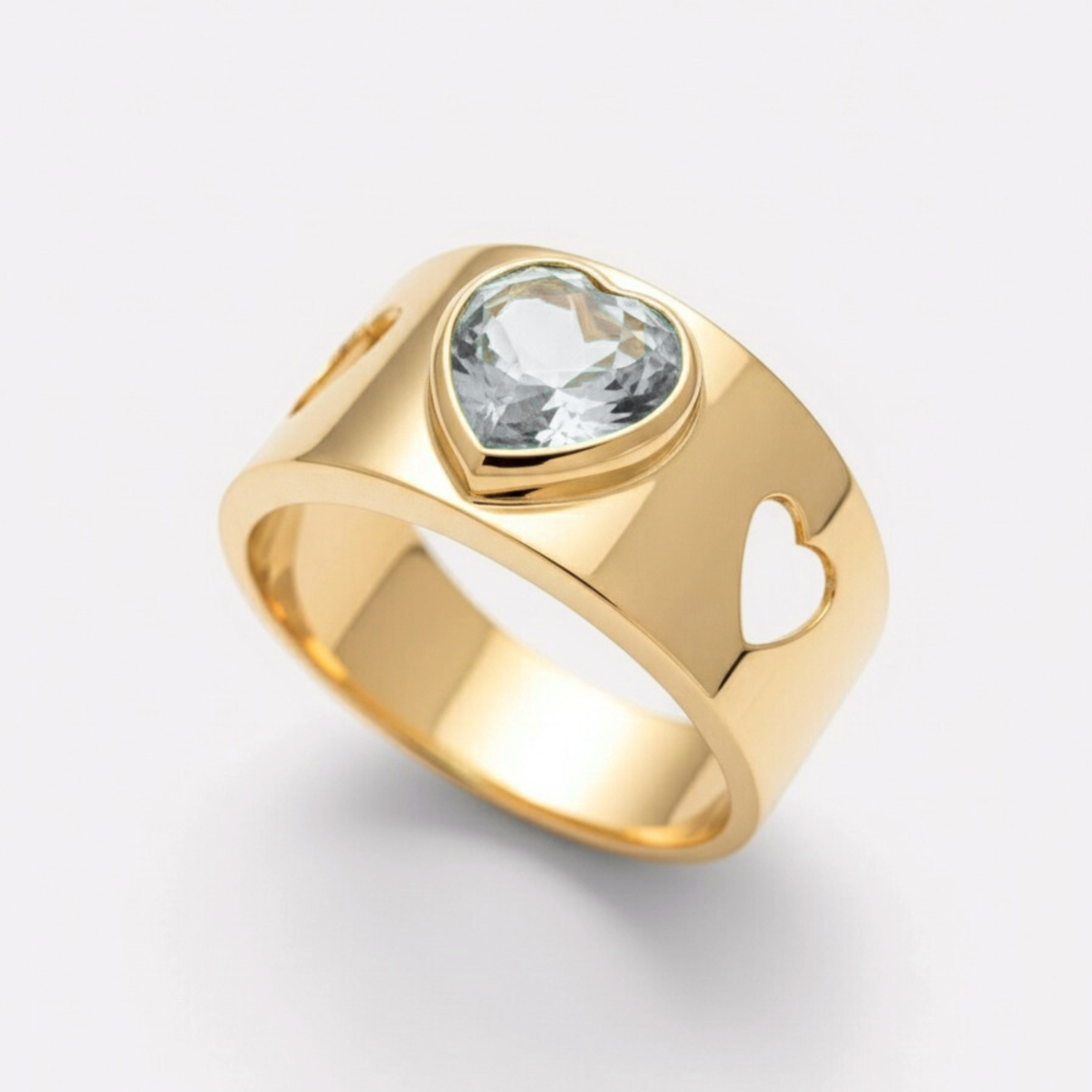 Anillo AGUAMARINA CORAZÓN BISELADO y corazones calados en oro amarillo 18k