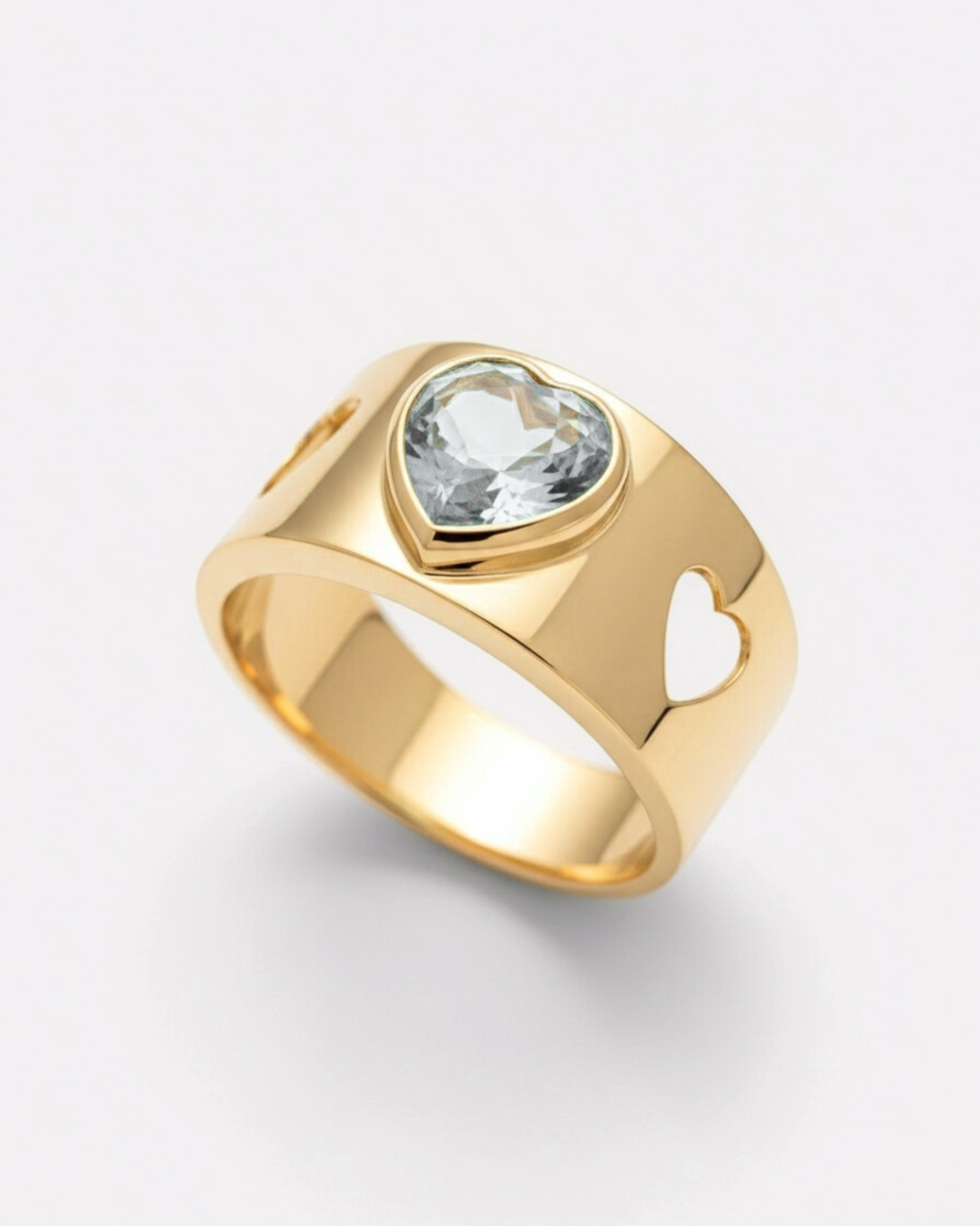 Anillo AGUAMARINA CORAZÓN BISELADO y corazones calados en oro amarillo 18k