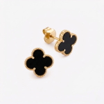 Aretes FLOR IMPERIAL CON ONIX NEGRO en oro amarillo 18k