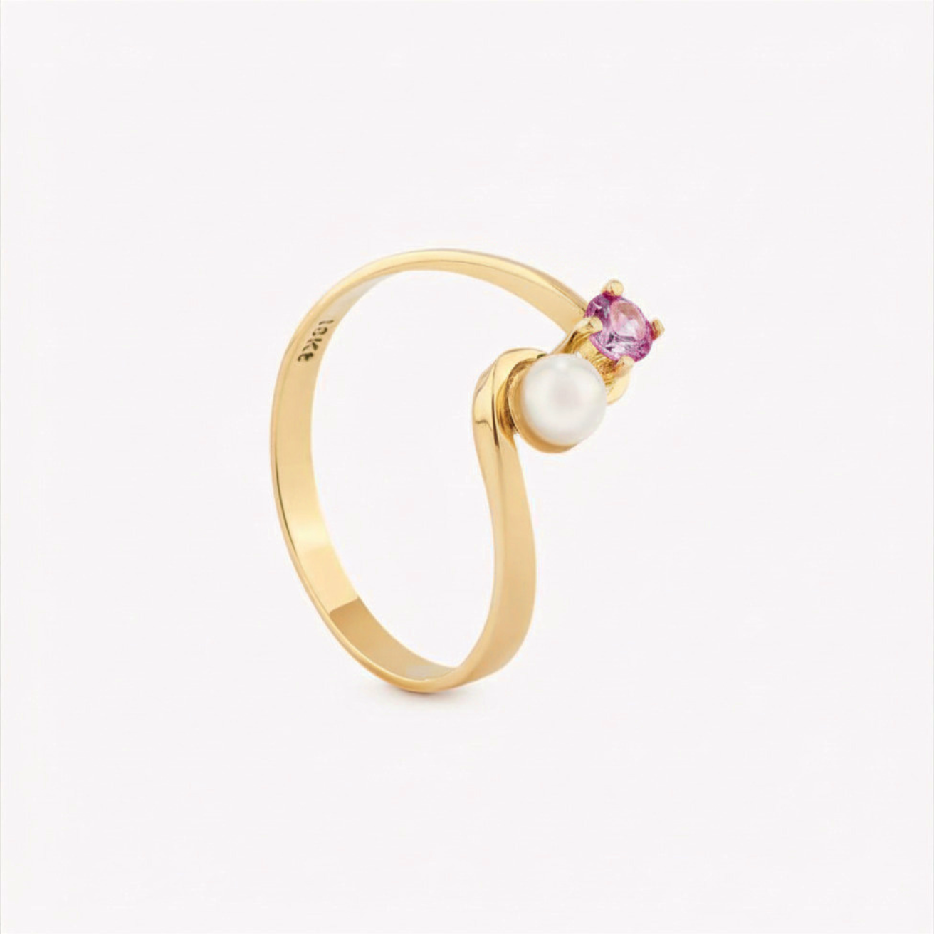Anillo TU Y YO CON ZAFIRO ROSA Y PERLA CULTIVADA en oro amarillo 18k