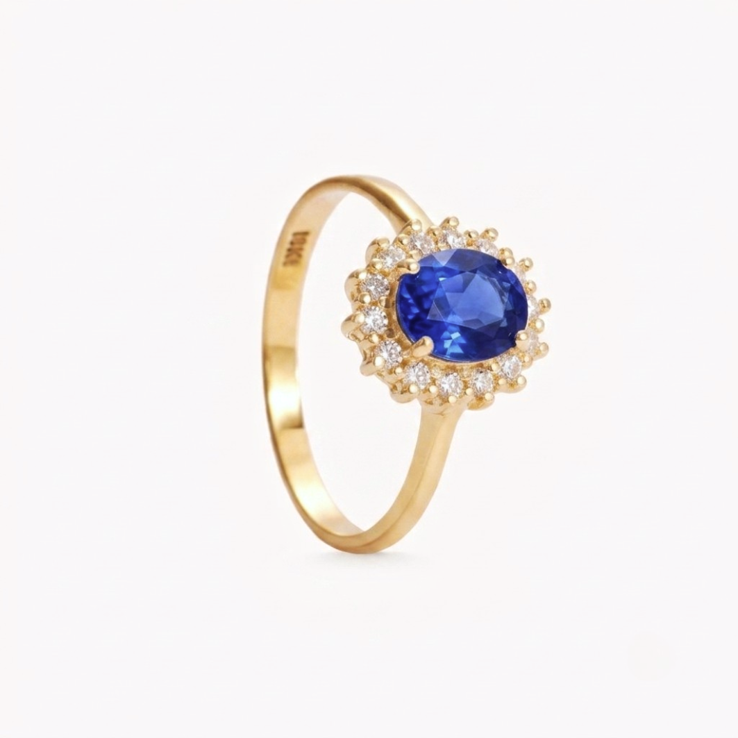 Anillo LADY DI CON ZAFIRO AZUL OVAL Y DIAMANTES en oro amarillo 18k