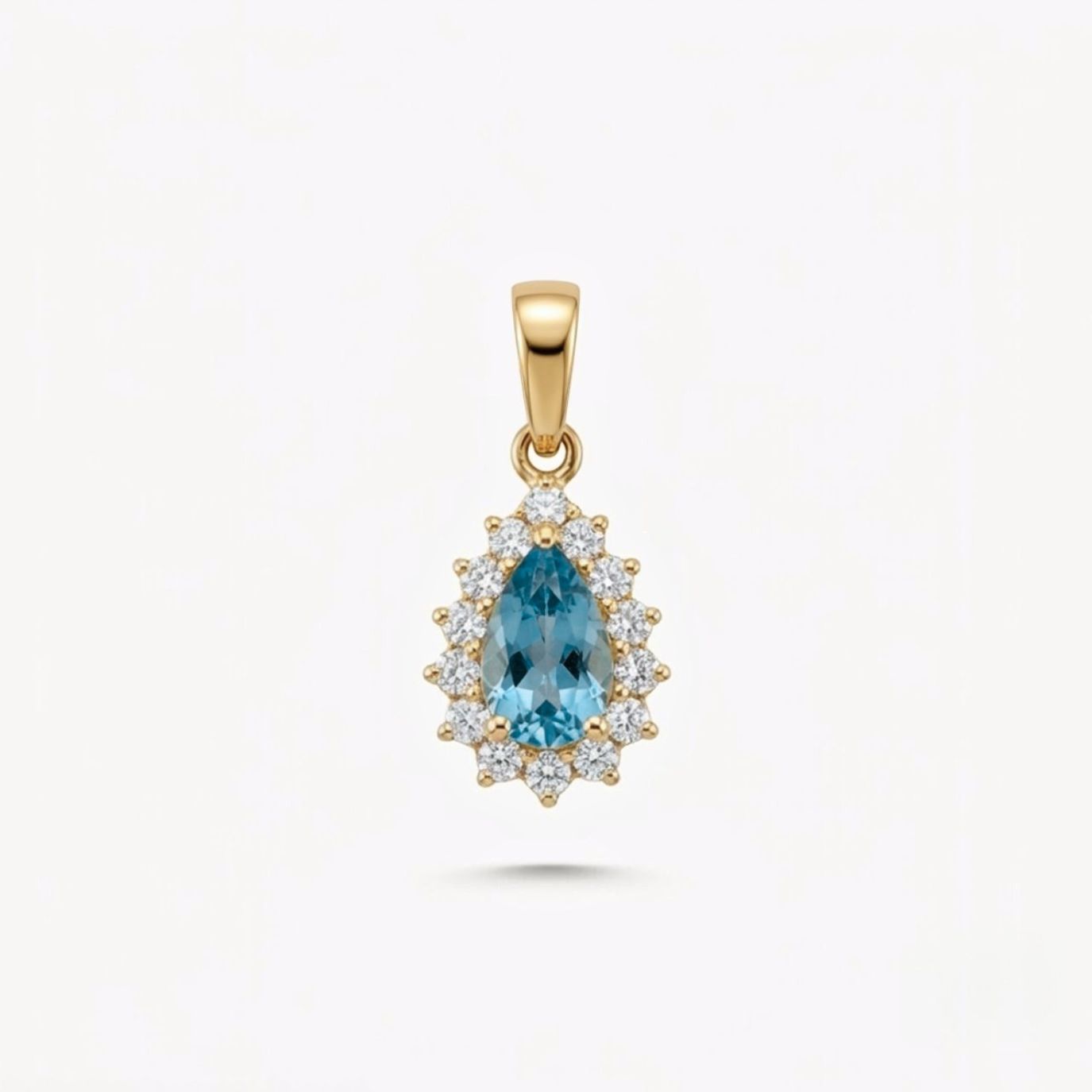 Dije ROSETA TOPACIO AZUL GOTA y moissanitas en oro amarillo 18k